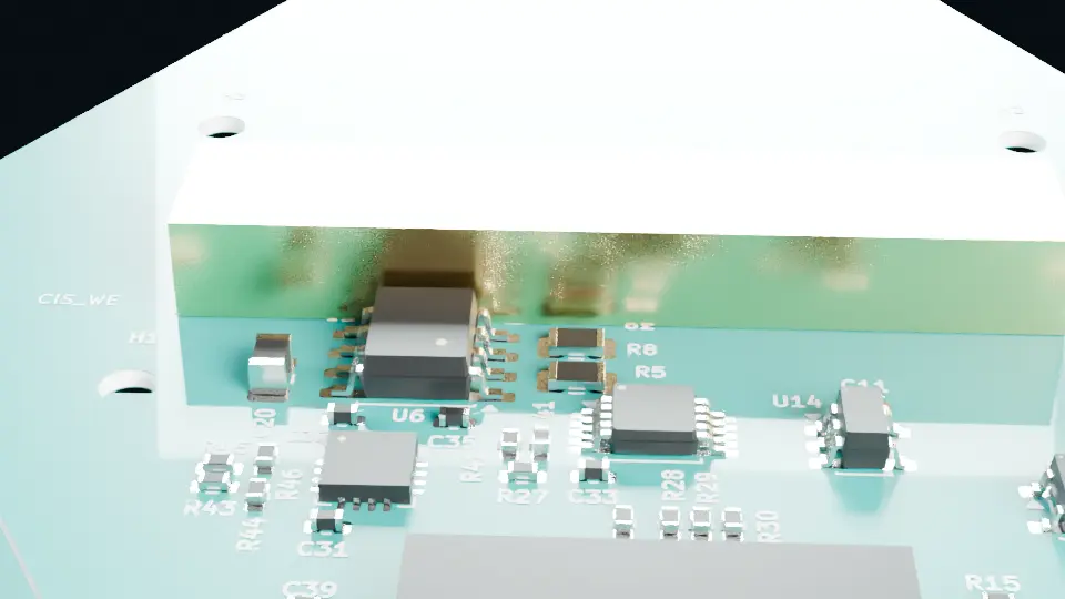 Macro of the low-current amplifier board: chips, passives, a gold-plated shielded can.